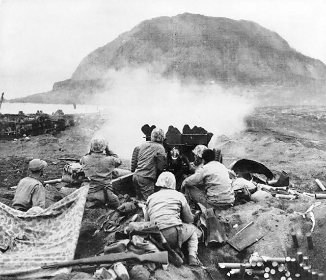 37mm_gun_fires_against_cave_positions_at_iwo_jima