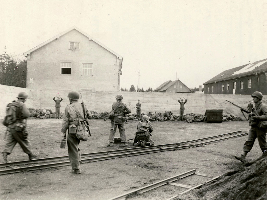 1024px-Dachau_execution_coalyard_1945-04-29