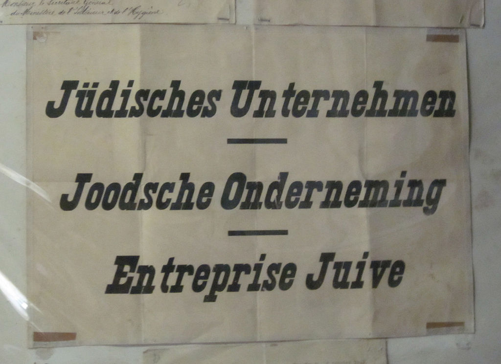 1024px-Poster_denoting_Jewish-owned_business_from_occupied_Belgium
