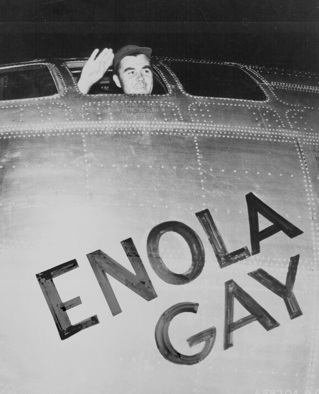 Captain Paul Tibbets in the Enola Gay minutes before takeoff to drop the first atomic bomb on Hiroshima, changing the world forever. 1945