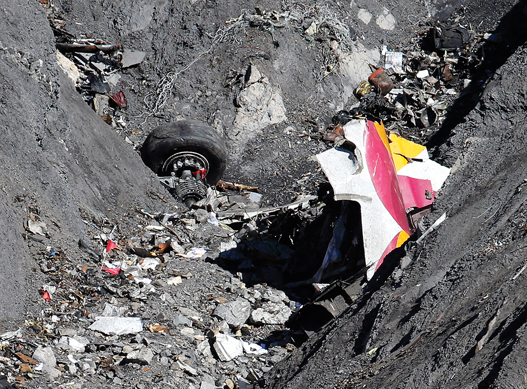 WRECKAGE OF THE AIRBUS A320 IS SEEN AT THE SITE OF THE CRASH, NEAR SEYNE-LES-ALPES
