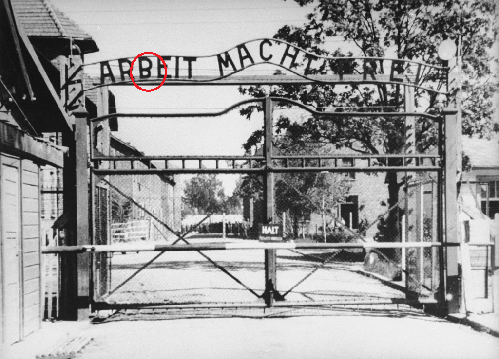 The Upside-Down “B” on the Arbeit Macht Frei Sign at Auschwitz-A small ...